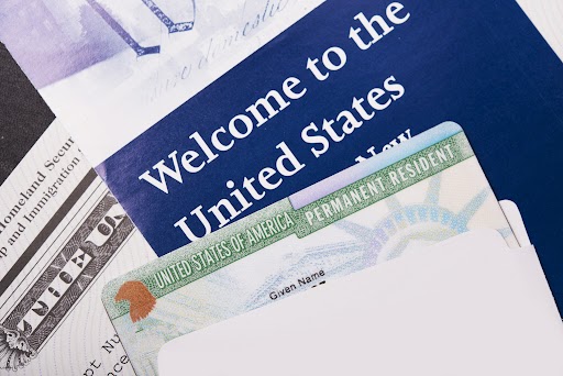 Welcome to the USA. Immigration Welcome Letter and Green Card Closeup. United States Homeland Security. Welcome to the USA:document, america, card, safety, resident, green card, benefits, usa, immigration, legal, permanent, homeland security, department, government, identification, immigrate, security, welcome, national, american, naturalization, united states, homeland, horizontal, closeup, symbol